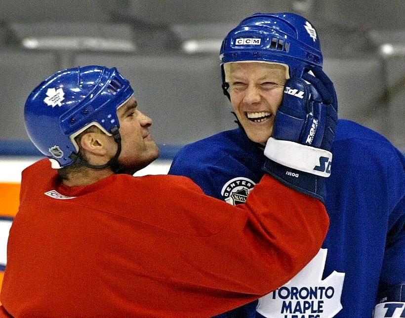 Former Toronto Maple Leafs captain Mats Sundin holds a puck as he stands on  center ice ahead of a Maple Leafs against the Boston Bruins NHL hockey game  in Toronto, Saturday, March